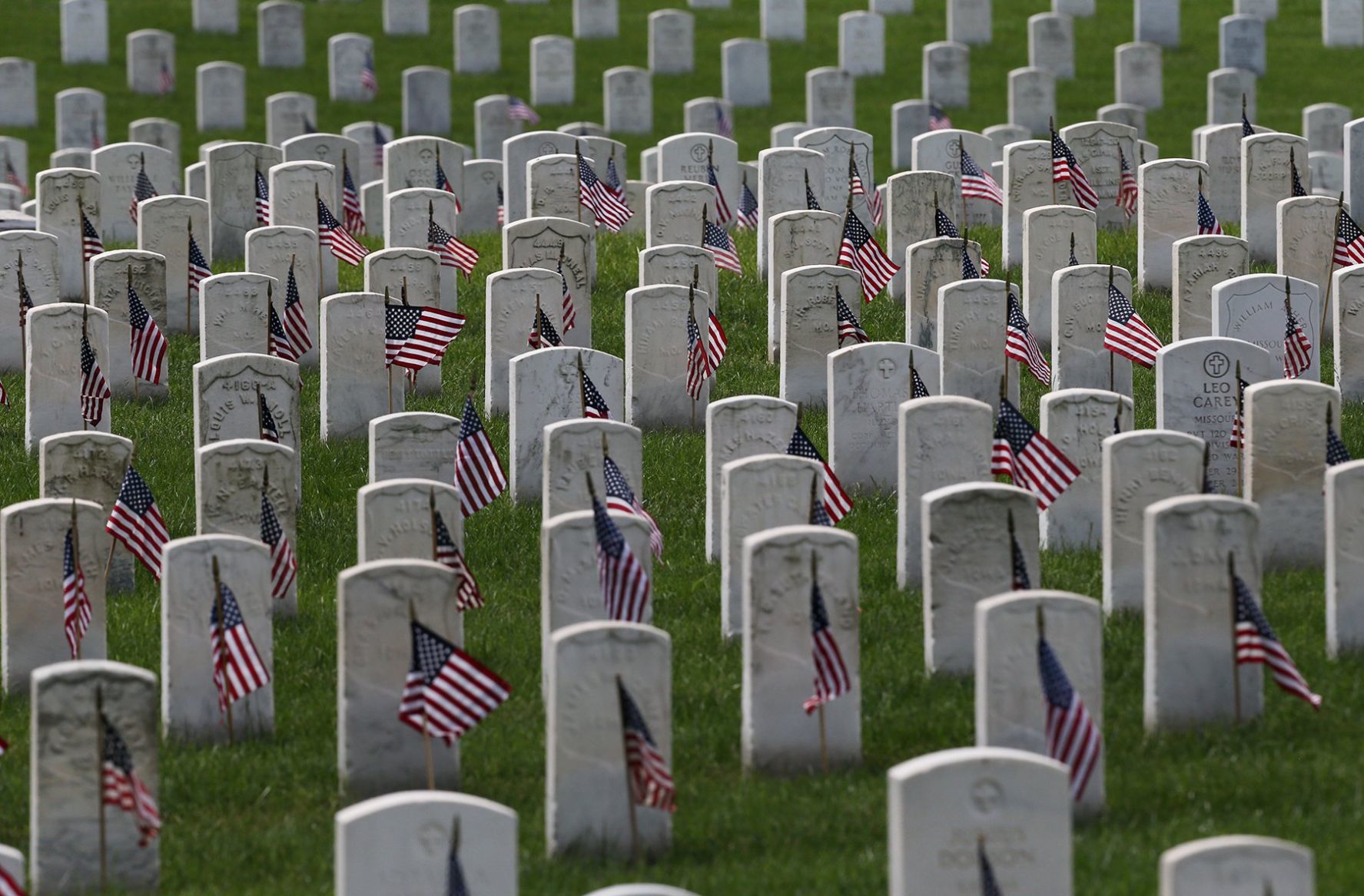 Scouts place flags in Jefferson Barracks for Memorial Day